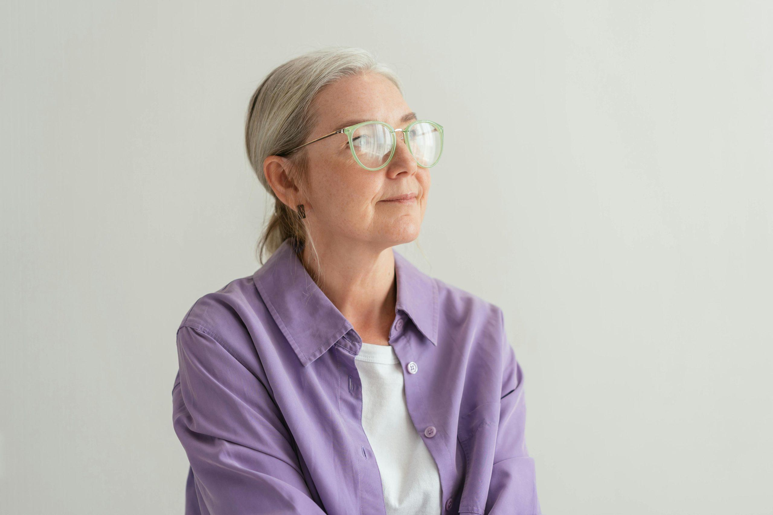 Older woman in a purple sweater