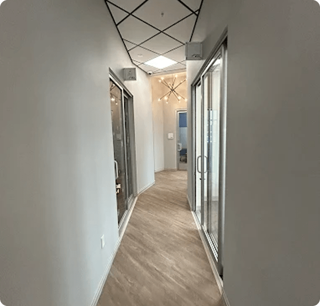 Bright, welcoming hallway leading to Lite Medical inside My Salon Suites in Blaine, Minnesota.
