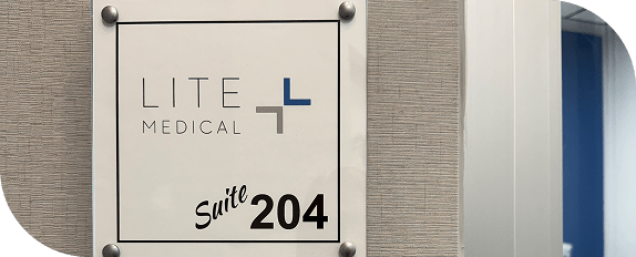 Lite Medical door sign at the entrance of suite 204 in My Salon Suites in Blaine, MN.