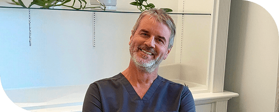 Smiling medical provider in a premier Lite Medical office located in Edina, MN.